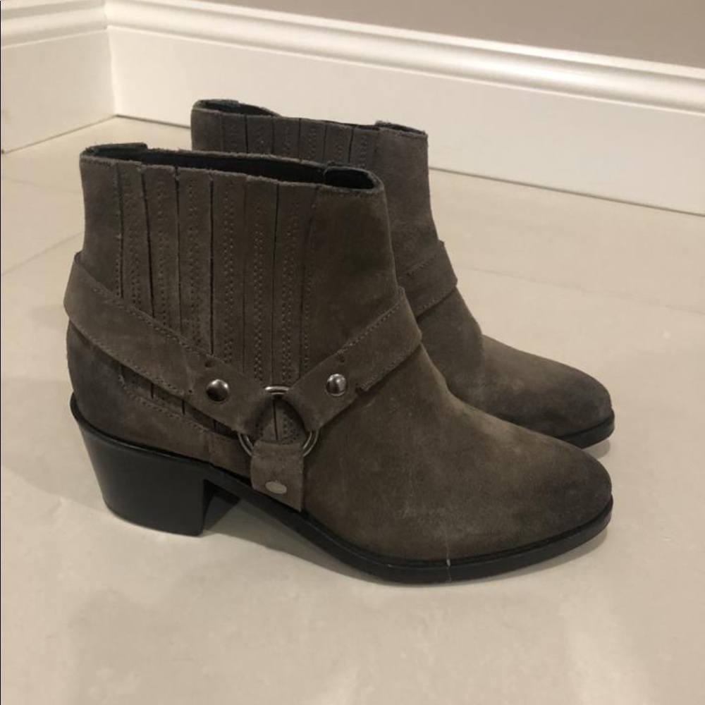 Western style boots with ankle strap detail